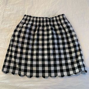 Plaid skirt with a cute scalloped detail!